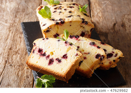 Baked sweet black currant cake with mint Baked sweet black currant cake with mint 47629982