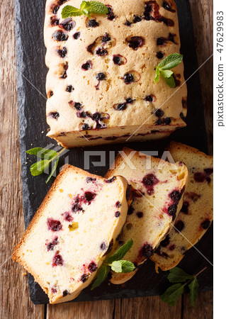 Dessert baking black currant cake close-up 47629983