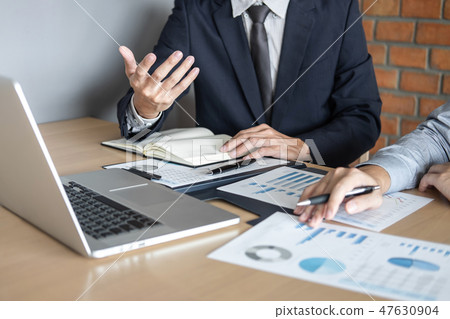 Professional Business partner discussing ideas planning and pres Professional Business partner discussing ideas planning and pres 47630904