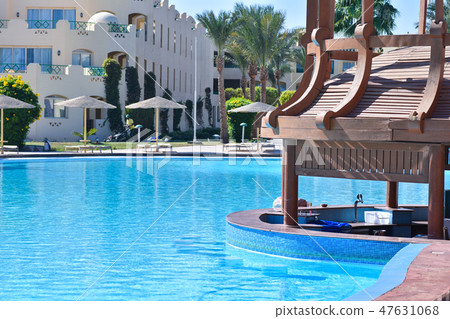 Swimming pool with bar on site in Egypt 47631068
