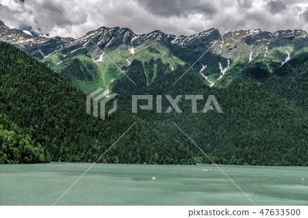 Mountains surrounding Ritsa Lake in an Abkhazia Mountains surrounding Ritsa Lake in an Abkhazia 47633500