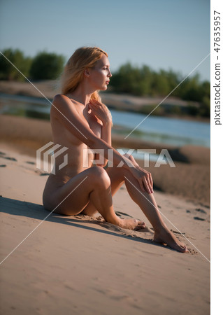 Beautiful girl model on sandy beach of the sea on tropical resort in summer 47635957