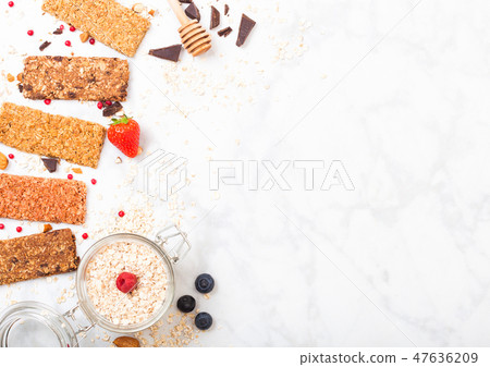 Organic cereal granola bar with berries with honey 47636209