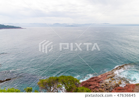 Marine red folded rocks Marine red folded rocks 47636645