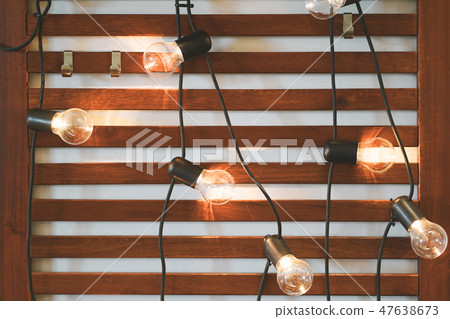 Light bulbs on Wooden Background. Light bulbs on Wooden Background. 47638673