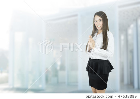 Asian business woman with Thai culture Sawasdee. 47638889