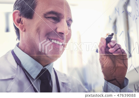 Happy chemist in process of new research 47639088