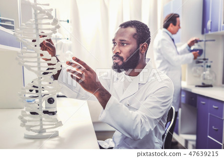 Starting clever chemist working busy in laboratory Starting clever chemist working busy in laboratory 47639215