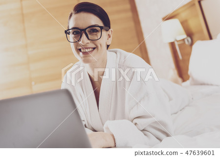 Gorgeous freelancer using a laptop Gorgeous freelancer using a laptop 47639601