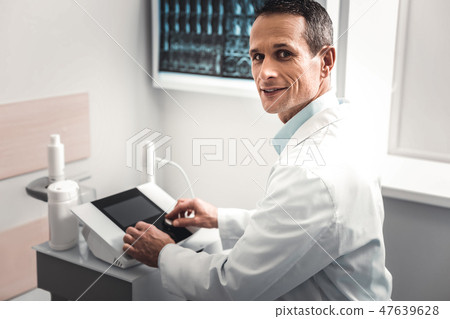 Professional modern chiropractor using medical facilities Professional modern chiropractor using medical facilities 47639628