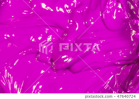 close up purple color of oil paint. close up purple color of oil paint. 47640724