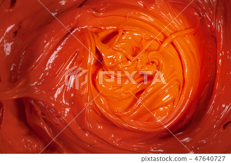 close up orange color of oil paint. 47640727