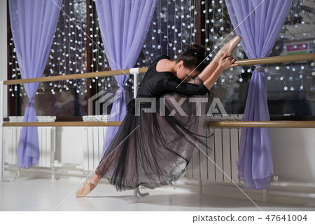 Ballerina in training hall Ballerina in training hall 47641004
