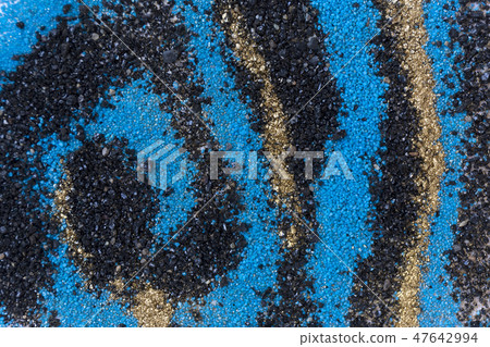 Layered colorful sand pattern. Marble style background. Blue and gold powder texture. 47642994