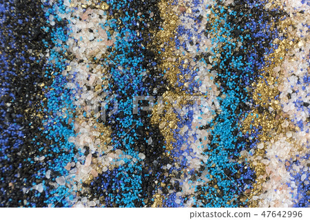 Layered colorful sand pattern. Marble style background. Blue and gold powder texture. 47642996