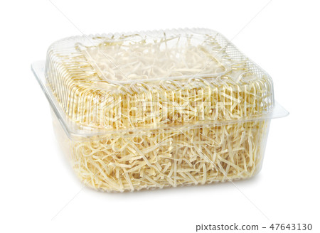 Dry egg noodles in clear plastic container 47643130
