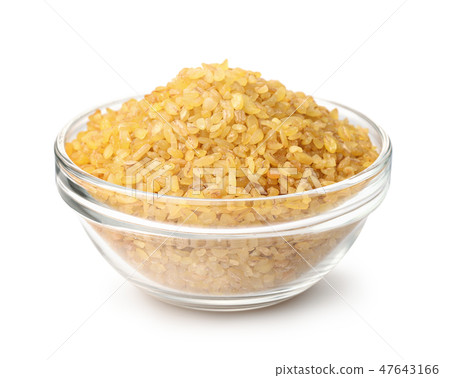 Dry bulgur wheat in glass bowl Dry bulgur wheat in glass bowl 47643166