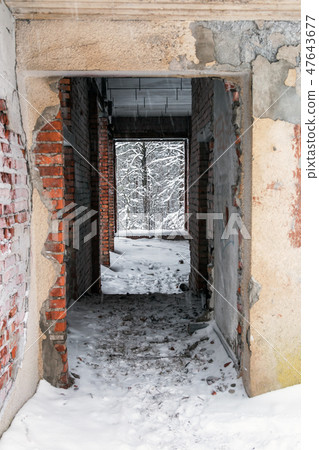 Brick ruins of an old house in the snow Brick ruins of an old house in the snow 47643677