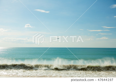 Airplane over the ocean Airplane over the ocean 47644197