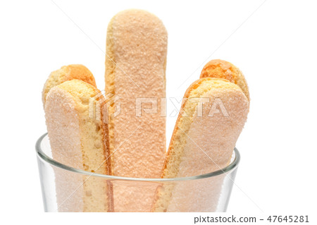 Traditional Italian Savoiardi ladyfingers Biscuits on White Background Traditional Italian Savoiardi ladyfingers Biscuits on White Background 47645281