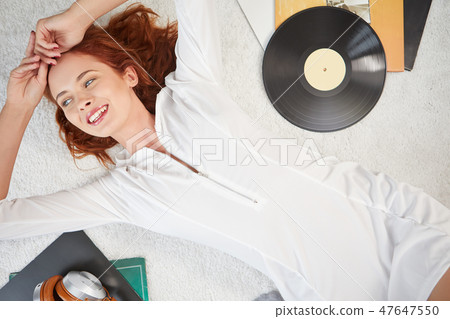 the image of resting sexy woman listening to vinyl the image of resting sexy woman listening to vinyl 47647550
