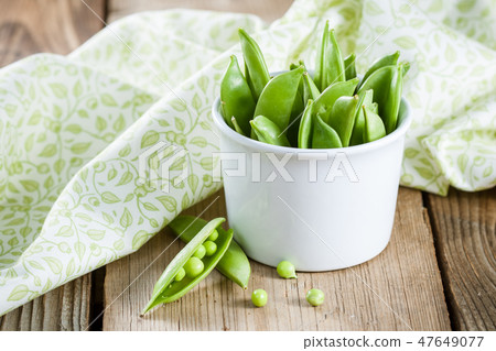 Green peas in a pods Green peas in a pods 47649077