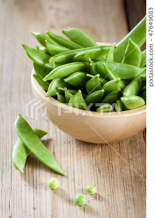 Green peas in a pods Green peas in a pods 47649083