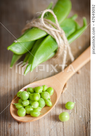 Green peas in a pods Green peas in a pods 47649092