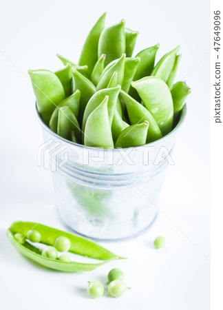 Green peas in a pods Green peas in a pods 47649096