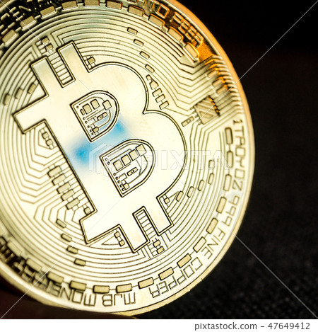 golden bitcoin coin 47649412