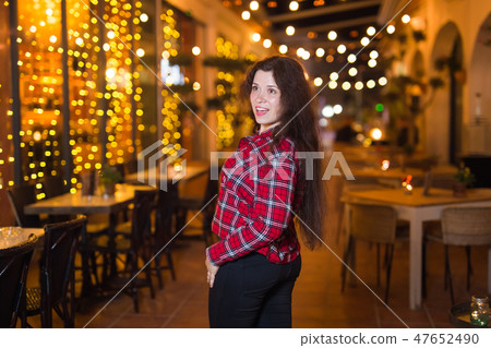 Nightlife, party and people concept - Beautiful young woman is have fun in the night city. 47652490