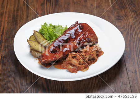 grilled ribs with vegetables 47653159