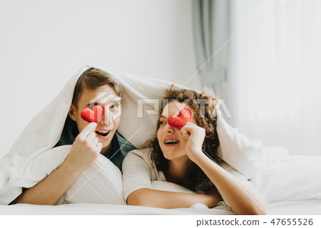 Happy couple in love with red heart 47655526