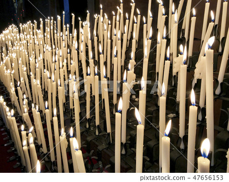 Prayer candles inside the Modena Cathedral (Duomo) Prayer candles inside the Modena Cathedral (Duomo) 47656153
