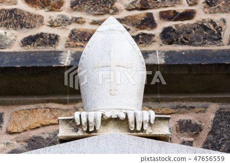 Symbols of bishop, mitre, gloves and book, 47656559