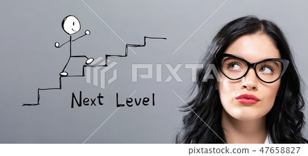 Next level concept with young businesswoman 47658827