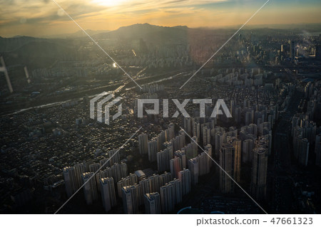 Aerial view cityscape of Seoul, South Korea. Aerial View Lotte tower at Jamsil. View of Seoul with Aerial view cityscape of Seoul, South Korea. Aerial View Lotte tower at Jamsil. View of Seoul with 47661323