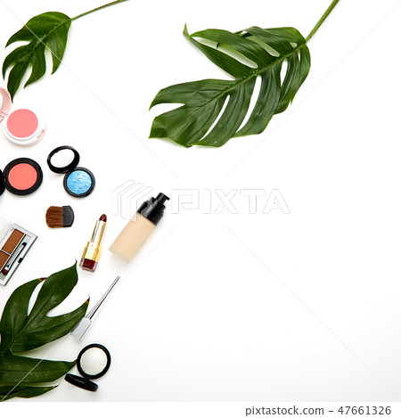 Make up products and brushes on white Make up products and brushes on white 47661326