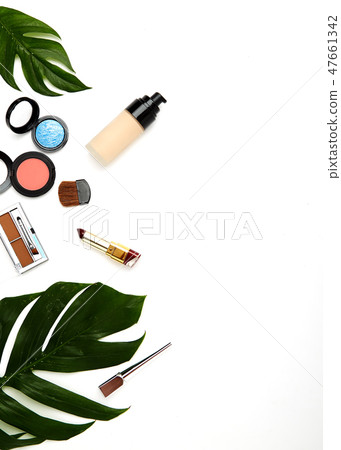 Make up products and brushes on white 47661342