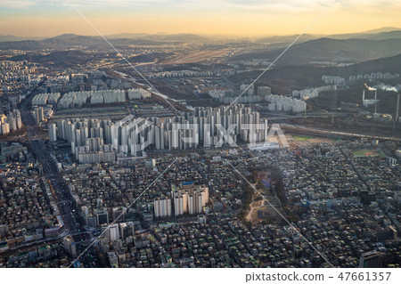 Aerial view cityscape of Seoul, South Korea. Aerial View Lotte tower at Jamsil. View of Seoul with Aerial view cityscape of Seoul, South Korea. Aerial View Lotte tower at Jamsil. View of Seoul with 47661357