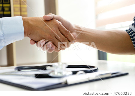 professional doctor handshake to the patient 47663253