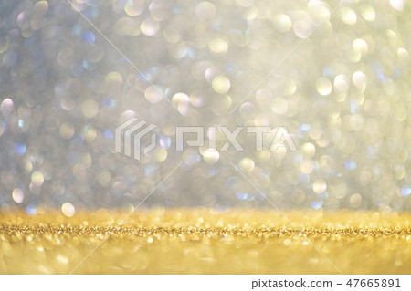 Abstract background filled with shiny gold and multicolour glitter Abstract background filled with shiny gold and multicolour glitter 47665891
