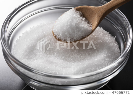 Salt and wooden spoon 47666771
