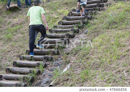 Men climbing stairs 47666856