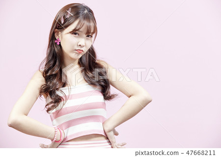 Retro, young woman, pink background 47668211