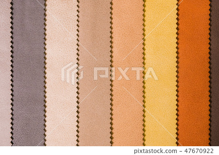 Colorful and bright fabric samples of leatherette furniture and clothing upholstery. Close-up of a Colorful and bright fabric samples of leatherette furniture and clothing upholstery. Close-up of a 47670922