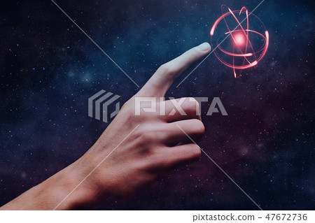 Human forefinger touches atom. Mixed media. Human forefinger touches atom. Mixed media. 47672736