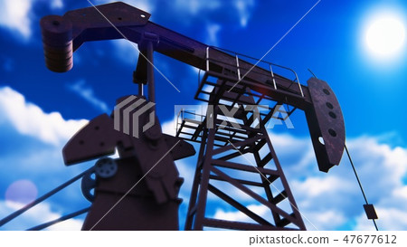 Pump jack industrial machine for petroleum in the sunset. Silhouette of a pump jack pumping oil 47677612