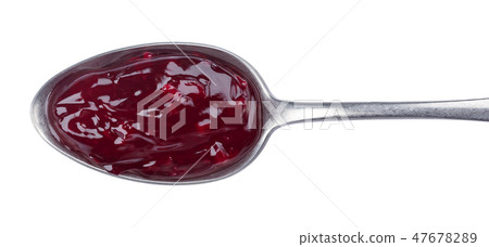 Spoon of red jam isolated on white background, top view 47678289