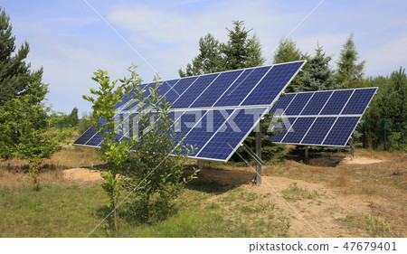 Two photovoltaic panels set in backyard Two photovoltaic panels set in backyard 47679401